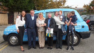 Photo caption for SAM 6829: Barbara Travis from Sysco Group, Mark King from the Oliver King Foundation, Sarah Smithson, operations manager at Stick ?n? Step, Val Coe, Cheryl Bradley, Rhys Griffiths, Nicola Meaney and Max Meaney.