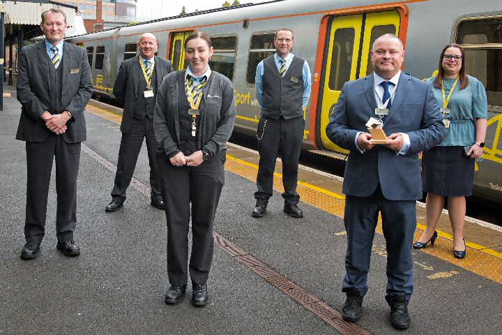 L-R Mike Heywood, Driver; Dave Hurst, Guards Manager; Dionne Gray, Guard; Paul Greenway, Station Retailer; Dave Stamper, Head of Performance and Zoe Hands, Chief Operating Officer