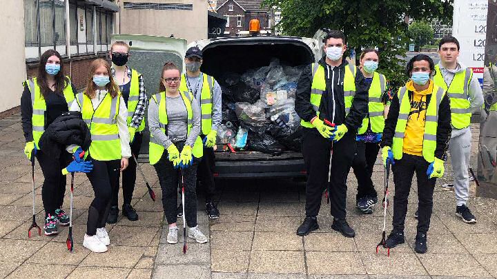 Hugh Baird College Community Action Group students with the litter they collected.