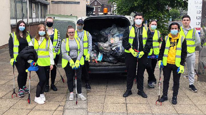 Hugh Baird College Community Action Group students with the litter they collected.