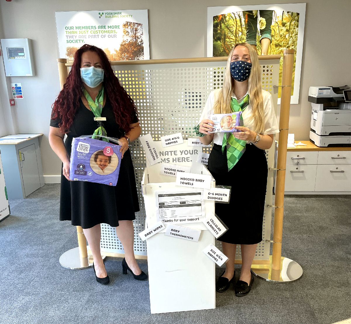 Colleagues from the Southport branch of Yorkshire Building Society with some of the items collected for The Baby Kind