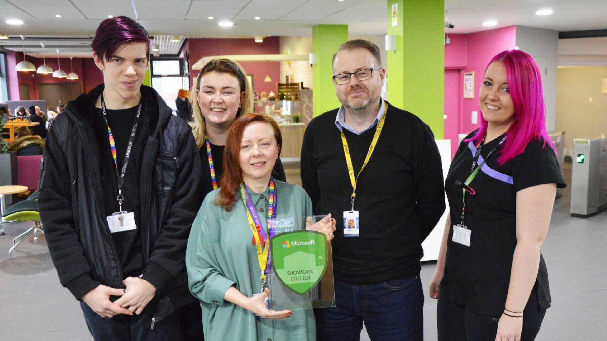 Hugh Baird College students with Hugh Baird College Director of Facilities and Technical Services, John Billington and Nicky Bowen, Hugh Baird College E-Learning and Training Officer. 