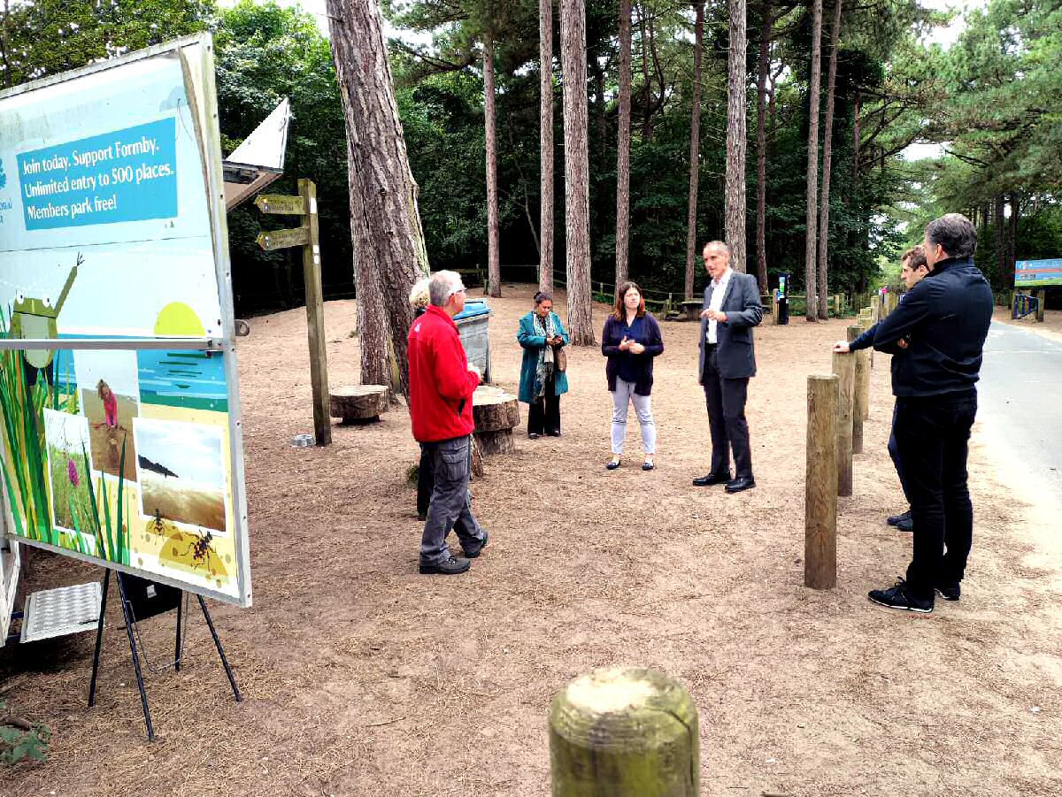 Bill Esterson MP, Emily Spurrell and Steve Rotheram speak with members of the public and volunteers at National Trust Formby.