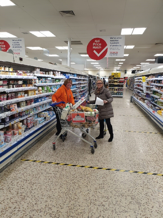 Formby Community Football Club players at the clubs launch; Two members of the orange army shopping for a person who was shielding...