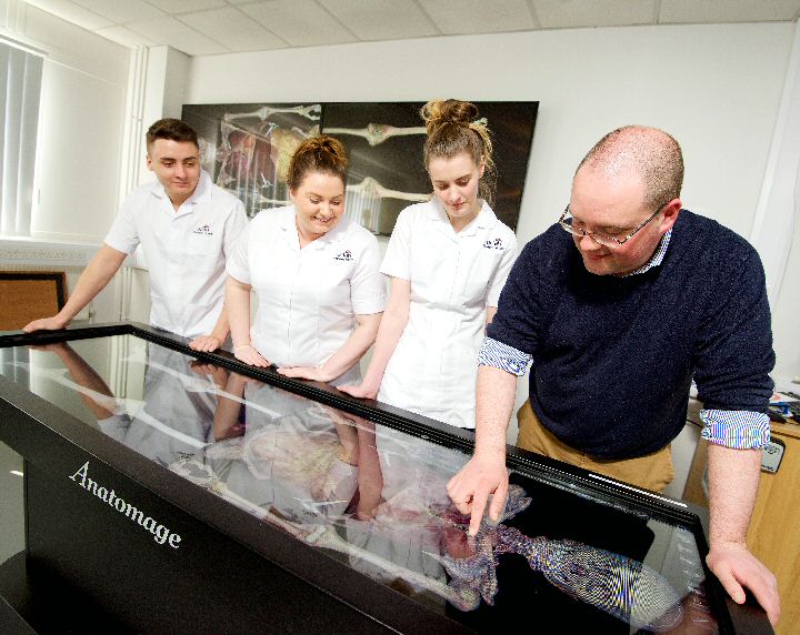 David Foster, Lecturer in Children's Nursing, explaining aspects of human anatomy to nursing students using one of UCLan's state-of-the-art anatomage tables.