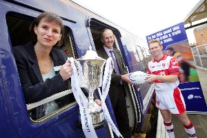 Heidi Mottram, Managing Director of Northern Rail, Richard Lewis, Executive Chairman, RFL and James Webster, Captain of last year's winning team - Hull KR celebrating the launch of the 2006 Northern Rail Cup
