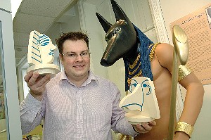 Museum manager Iain Morley with some of the glittering Egypt exhibits at Prescot Museum, Knowsley.