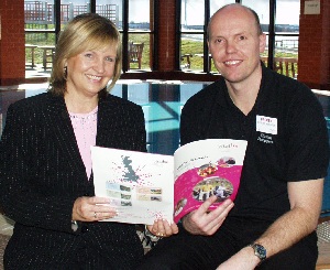 Joan Halse (Thwaites Trust) checks out the brochure at Sandpipers with centre manager Darren Holloran.