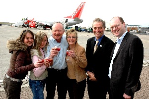 Four lucky passengers about to board the inaugural flight to Alicante.