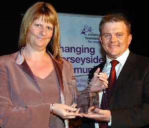 Debbie Thomson, Senior Business Banking Manager at Alliance & Leicester Commercial Bank, collected the award on behalf of the bank from Lee Mills, of award sponsor David McLean