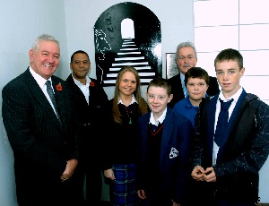 Some of the students from St Benedicts (left to right  Kayleigh Byrom, James Matthews, Callum Brodie and Nathan Kelly, with headteacher (back) Jim McTague) joined Councillor Dowd (far left) and Peter Ogunsiji to unveil the artwork at Liverpool South Parkway