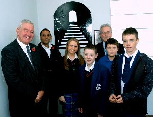 Some of the students from St Benedicts (left to right – Kayleigh Byrom, James Matthews, Callum Brodie and Nathan Kelly, with headteacher (back) Jim McTague) joined Councillor Dowd (far left) and Peter Ogunsiji to unveil the artwork at Liverpool South Parkway