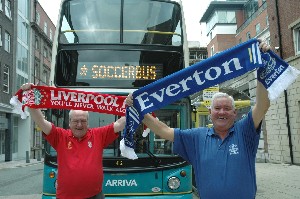 Pictured: Cllr Mark Dowd (Everton) and Cllr Jack Spriggs (Liverpool) with the Soccerbus