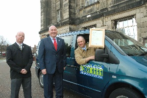 Pictured: Driver Nigel Brierley with Tony Norbury (left) and Cllr Alan Dean at Wallasey Town Hall.