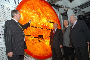 Picture 2: Cllr Ron Abbey (far left) and Cllr Jack Spriggs (far right) show Alexander Volkov (centre left) and Alexander Martynov (centre right) one of the exhibits at Spaceport.