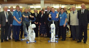 Pictured are Rehab patients on the new machines, John Taylor (left) with Rose Duncan and Peter Barton, with Clare Taylor. They are surrounded by members of the Southport Lodges of the Mark Masons
