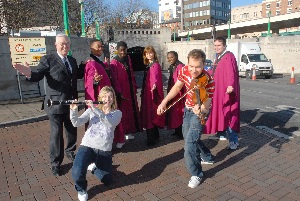 Pictured:- Councillor Ken McGlashan (left), Chair of Merseytravels Tunnels Board, launches Under and Over the Mersey with Liverpool Lighthouses Love and Joy Gospel Choir and Paul Lovell (violin) and Deborah Crouch (clarinet) of the Liverpool Philharmonic Youth Orchestra.