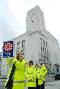Pictured: The Tunnel Tours team, with the award, outside Georges Dock Building  