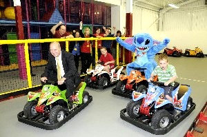 Cllr Denis Knowles with Jack and Harry Chesworth from Wrexham and Stitch (from the film Lilo and Stitch) at the start of the Seacombe Grand Prix!