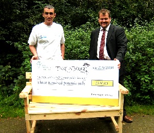 Sefton Coast and Countryside Services Ian McAleavy (left) is presented with the prize cheque by David Hunter (right) of the Northwest Regional Development Agency (NWDA).