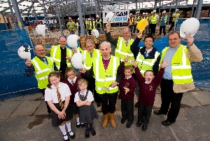 The Rt Rev David Jennings, Bishop of Warrington (centre) after blessing construction on the new Rimrose Hope CE School, accompanied by (from L-R): Gordon Robinson, Morgan Ashurst site manager; Rev Gregor Cuff, Christ Church Waterloo; Rosemary Tootill, Sefton Borough Council; Paul Cummins, Sefton Borough Council; Lawrence Crill, headteacher of Rimrose School; Patrick Lai, architect for Sefton Borough Council and Roger Driver, cannon of Liverpool Cathedral.