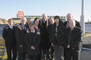 Staff, children and teachers celebrate the donation at the Wallasey depot of the Mersey Tunnels