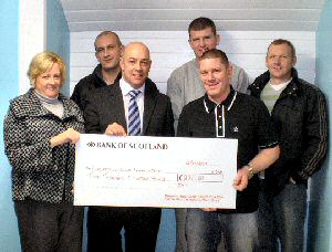 Merseyside Police (back row) Mark Howard, Mike Carroll, Dave Brent, and L-R (front row) Donna Baxter, Dave Keegan and Mike Farrington raise funds for CCR.