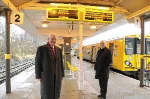 Cllr Dowd (left) and Cllr Blakeley at New Brighton Station following the investment programme.