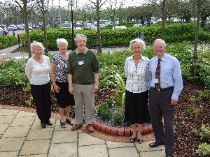 The is the new area. Pictured from left to right Pat Stuart, Gladys Quirk and Nick Morton, volunteers who work in the shop and Audrey and Ron Stuart who manage the shop.