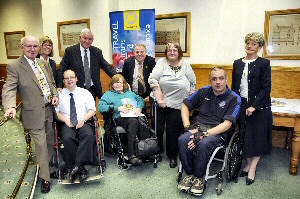 (from left to right) Councillor Dave Callan, Jane Greene of Merseylink, Councillor Mark Dowd Chair of Merseytravel, Councillor Peter Millea with Merseylink service users.