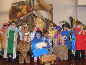 Children from Farnborough Road Infant School performing a live nativity at Dobbies Garden World Southport.