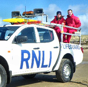 RNLI lifeguards Clare Rooney and Andy Jordan.