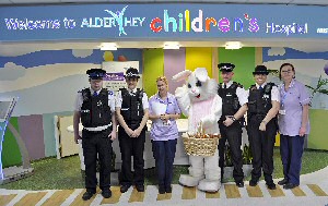 PSCO Mark Gower, Constable Kate Hankin,  PCSO Rose Main and Easter Bunny - PSCO Nicola Walsh with Alder Hey staff.
