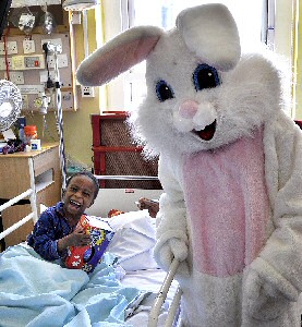 Easter Bunny with one of Alder Hey's patients.