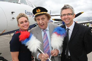 Linzi Johnston Eastern Airways Cabin Attendant, Ken Dodd and Robin Tudor, Head PR Peel Airports at Liverpool John Lennon Airport