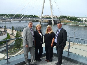 Attached photograph showing the launch of the event in Southport at the Ramada Plaza Hotel. Pictured are, left to right: Steve Christian, Tourism Manager Sefton Tourism; Gill Ribis, Sales Manager Scarisbrick Hotel; Julia Fahey, Group Sales and Travel Trade Officer Sefton Tourism and Peter Robinson General Manager of the Ramada Plaza Hotel Southport.