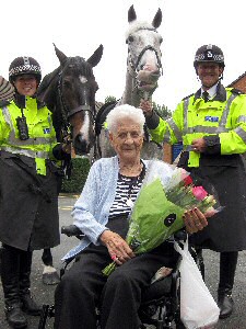 Constables Coleman and Anwyl visiting Betty for her 100th Birthday