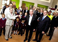 Construction director at Conlon Construction, Michael Conlon (right) and site manager Gordon Mackenzie hand the school key to head teacher Sister Moira Meeghan.