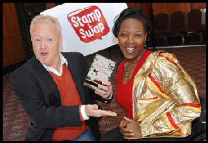 Paralympian Anne Wafula Strike swaps a copy of her autobiography for a jacket Keith Chegwin wore on Swap Shop for ADD Internationals Stamp and Swap campaign.