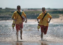 RNLI lifeguards Becky Ellis and Josh Abrahams are in training for the RNLI's Summer Series.