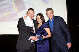 Pete Myers (Head of Service Quality) and Jane Lawrence (Internal Communications Manager) of Northern Rail, celebrate the award win with host Jeremy Vine of BBC Radio 2.