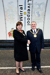 L-R- Mayor of Wirral, Councillor Moira McLaughlin with Lord Mayor of Liverpool, Councillor Frank Prendergast at the Wirral and Liverpool crests