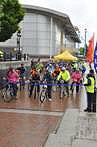 Riders celebrate after completing the Manchester to Liverpool bike Ride.l 