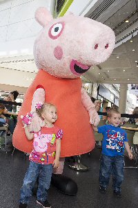Lucy and Thomas Roche aged 3 from Tranmere take their turn to meet Peppa.