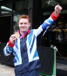 Daniel Purvis shows off his Bronze medal