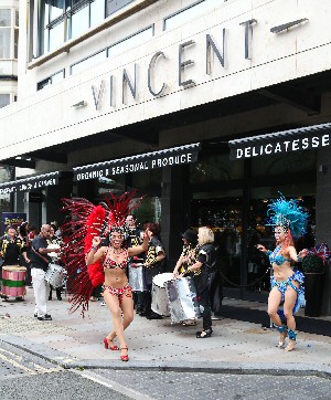 Samba band & dancers entertain on Lord Street.
