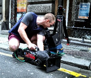 Camera man all the way from New York, filming TV show about Liverpool Football Club.