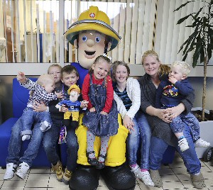 15: Fireman Sam with (children left to right) Korey Johnson, A.J Johnson, Jack Eccleson , Lillie-Mae Johnson, Charlotte Eccleson, Josh Eccleson and mum Karen Eccleson.