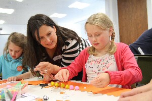 Daisy Dawes gets crafty with fascinated children.