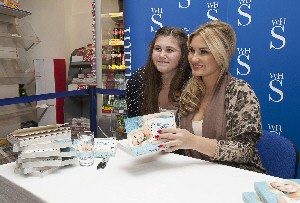 Georgia Johnston is one of the many youngsters to meet Sam at WH Smith in The Grange and Pyramids Shopping Centre.